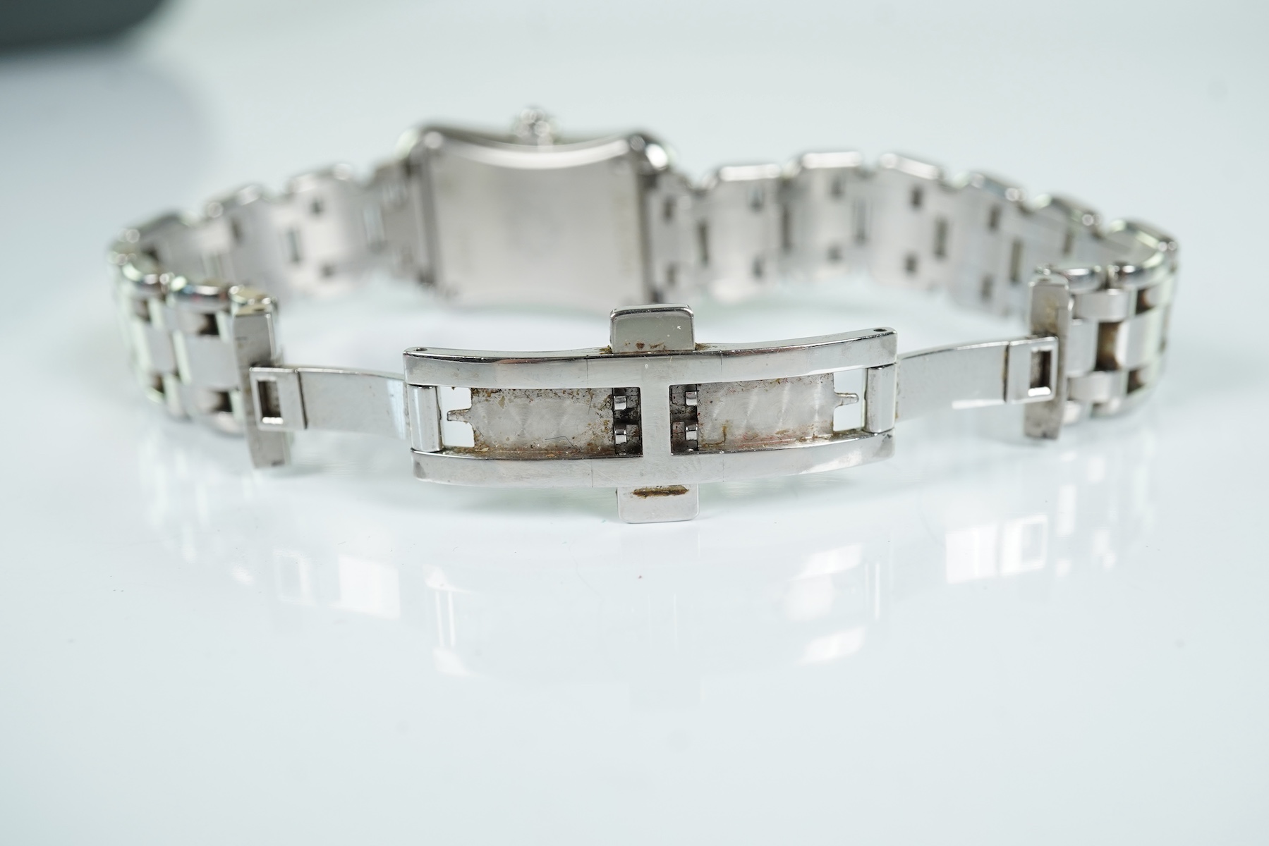 A lady's 2007 stainless steel and diamond set Carl F. Bucherer quartz wrist watch, on a stainless steel bracelet